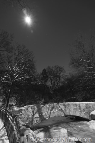 A cold winter night as the full moon showers the ice and snow with abundant light