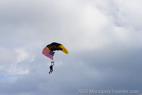 Skydivers opening the flag football game